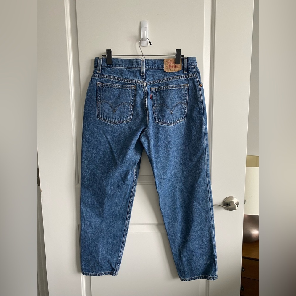 Vintage Levi’s 550 classic relaxed women’s mom jeans medium wash denim 14 short